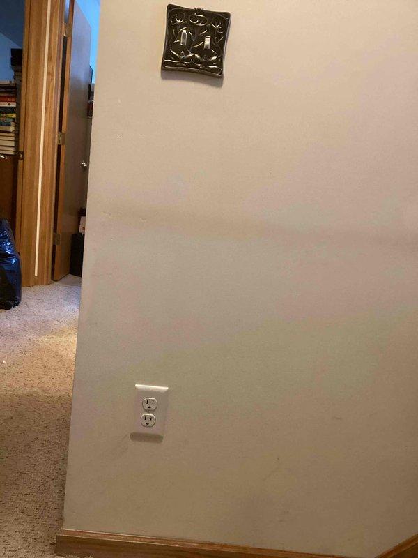 Installed a new duplex receptacle beneath an existing switch box for a stair chairlift. Work included cutting in a box, running 5' of wire, and installing the outlet with cover plate. Completed installation successfully, providing required power source for client's mobility equipment.