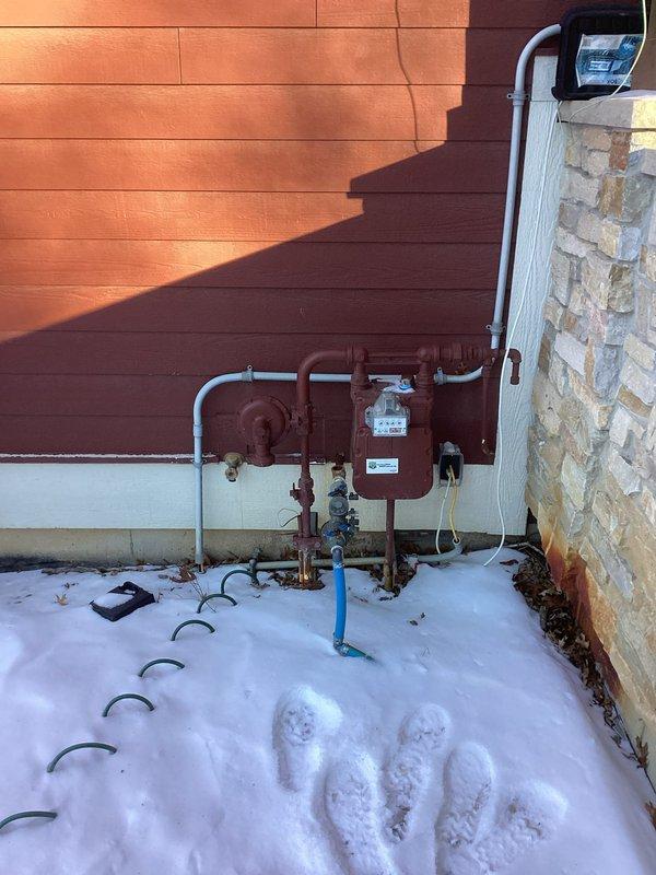 Performed gas bonding for property sale requirement. Installed bonding wire from exterior gas meter to main grounding system in utility room, following same path as existing CSST gas line. Completed proper grounding connections at both termination points to ensure code compliance.
