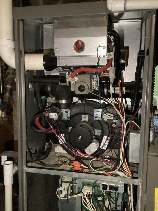 Responded to no heat call for 10+ year old system that was only heating when thermostat was set to 80° or higher, reaching maximum temperature of 71°. Diagnostic inspection revealed dirty flame sensor interfering with proper ignition sequence. Cleaned flame sensor, restoring normal heating operation and proper temperature regulation.