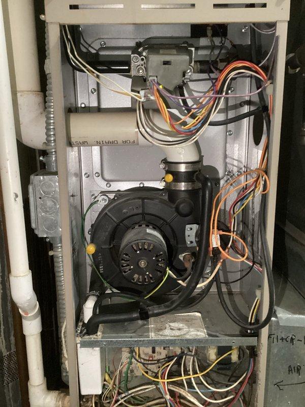 Responded to no heat service call for furnace under 10 years old. Diagnostic inspection revealed plugged condensate line as root cause of heating failure. Cleared condensate drainage system, restoring proper furnace operation and heat production.