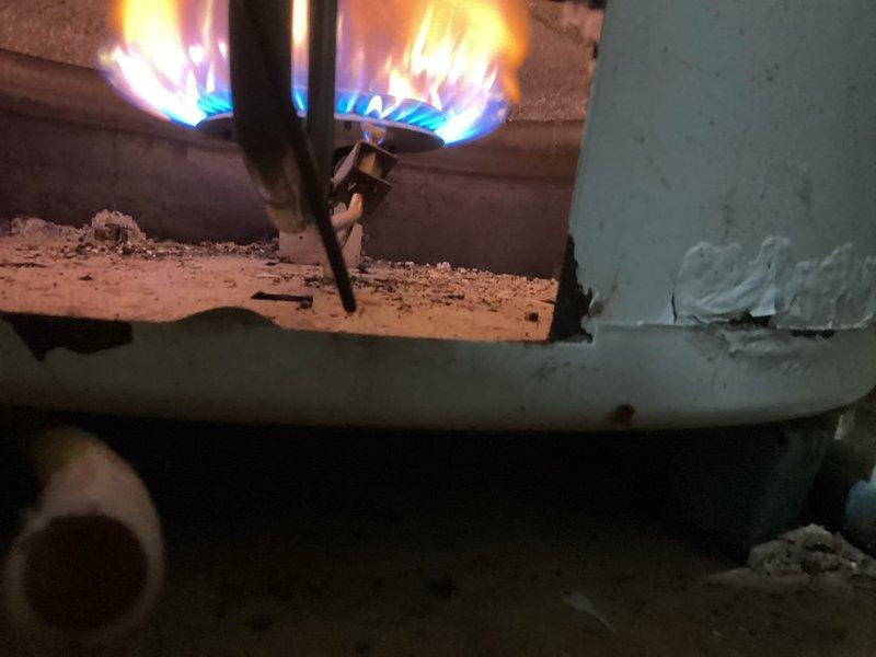 Responded to a call back for insufficient hot water after previous service. Diagnosed a faulty heat sensor on the 75-gallon atmospheric vent water heater. Installed new heat sensor which resolved the issue, allowing the unit to ignite properly and maintain temperature as set on the gas control valve. Verified proper burner operation and informed customer that due to the age of the unit, replacement may be necessary if further issues arise as AO Smith no longer manufactures replacement gas control valves for this model.