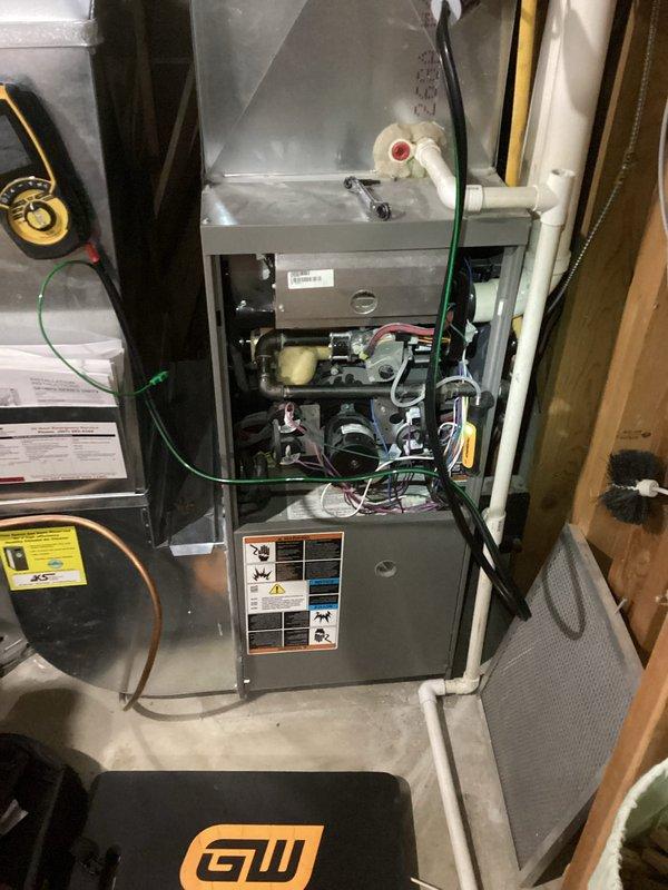 Performed scheduled preventive maintenance on residential HVAC system after rescheduling. Accessed furnace, inspected internal components including control board, motor, and electrical connections. Completed full system tune-up with all operations verified normal and functioning properly.