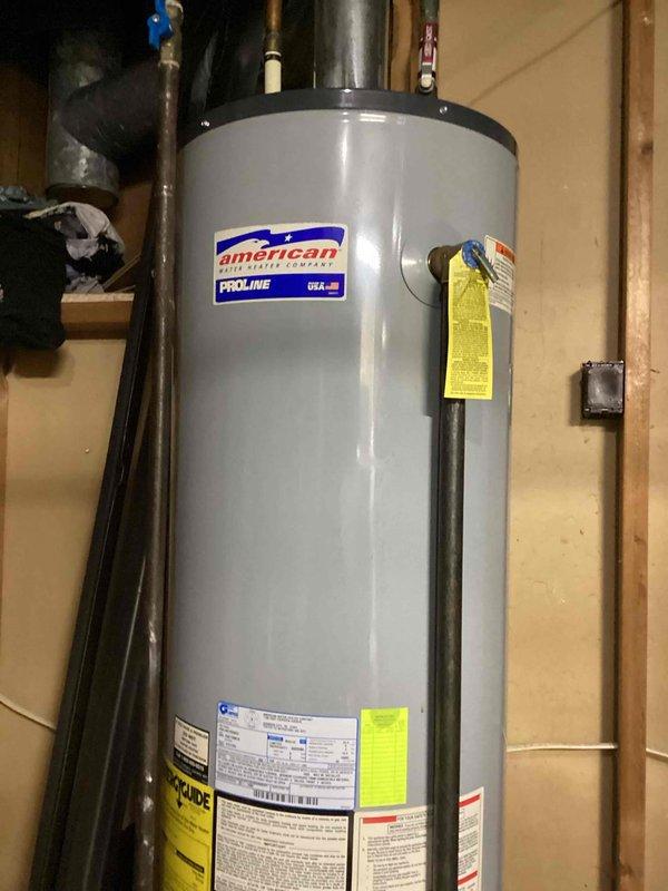 Responded to service call for non-operational American ProLine water heater. Upon inspection, determined pilot light was extinguished. Successfully relit pilot manually and restored normal operation of the unit. Verified proper functioning of water heater before completing service.
