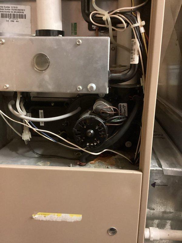 Responded to no heat call for 10+ year old York furnace. Diagnosed failed inducer motor causing extremely loud noise and heating failure. Replaced inducer motor assembly to restore proper system operation and heating function.