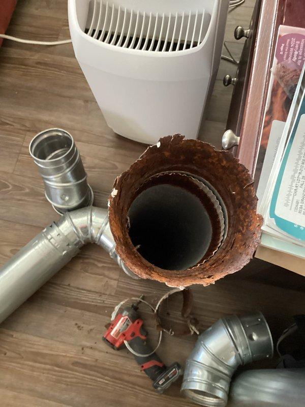 Responded to emergency no-heat call after utility company red-tagged customer's furnace due to CO2 leak. Diagnosed failed flue pipe and gas line with severe corrosion and deterioration. Replaced damaged components and successfully restored heat service to the residence.