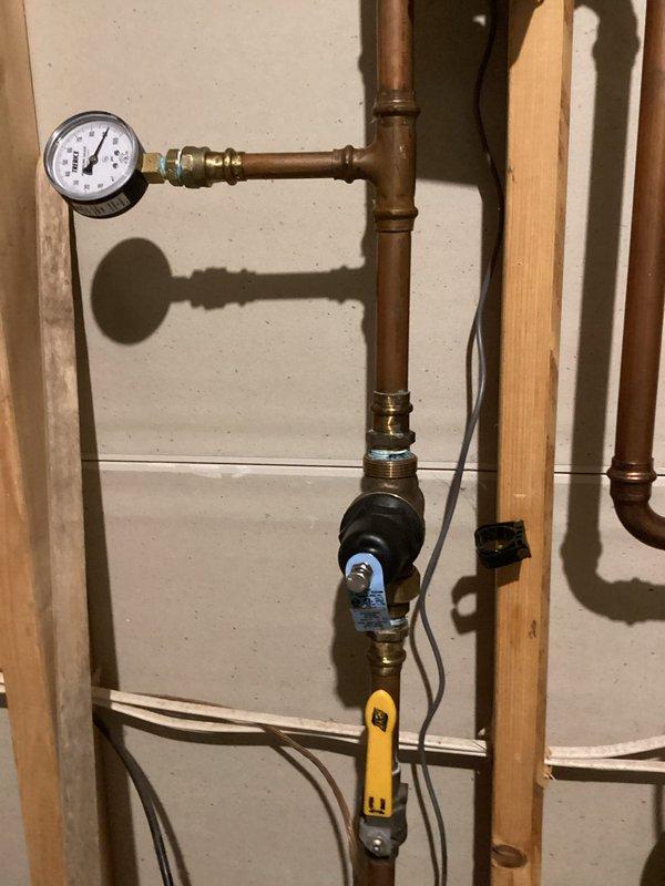 Responded to service call for high water pressure issue. Diagnosed faulty pressure reducing valve allowing 90psi into main line. Installed new PRV and calibrated system pressure to 65psi, resolving the excessive pressure problem. System now functioning correctly.