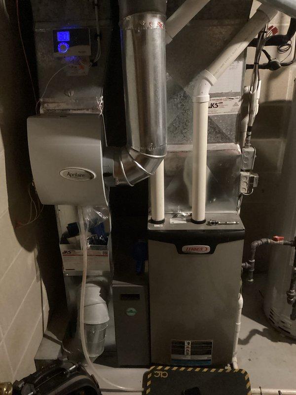 Diagnosed no heat complaint in Lennox furnace system. Located high limit switch causing low voltage fuse to pop. Removed limit switch, performed visual inspection of heat exchanger and surrounding components, then reinstalled limit switch to restore proper operation.