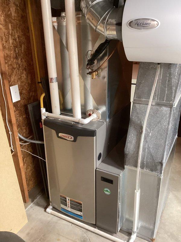 Diagnosed no heat condition in Lennox furnace system. Inspection revealed faulty pressure switch preventing proper operation. Removed and replaced defective pressure switch, restoring normal heating function.