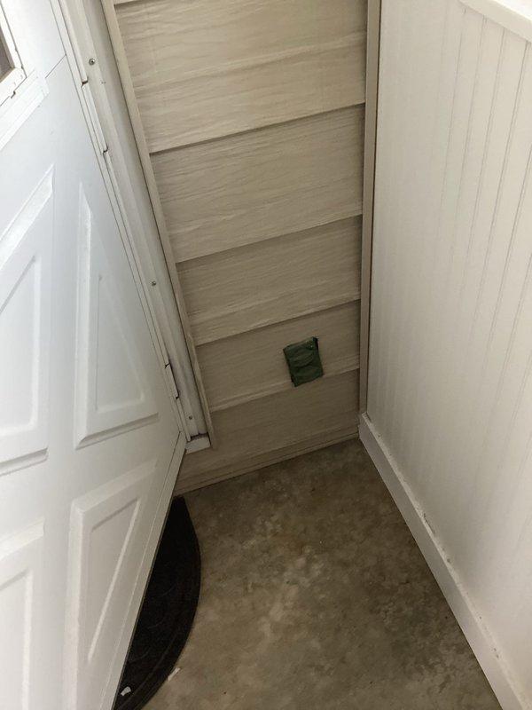 Responded to service call for non-functioning exterior outlet and faulty light switch. Inspection revealed damaged outlet with scorch marks and insufficient mounting to tin siding. Replaced defective outlet, installed proper outdoor protective cover, and replaced malfunctioning 3-way switch to restore full functionality to both electrical components.