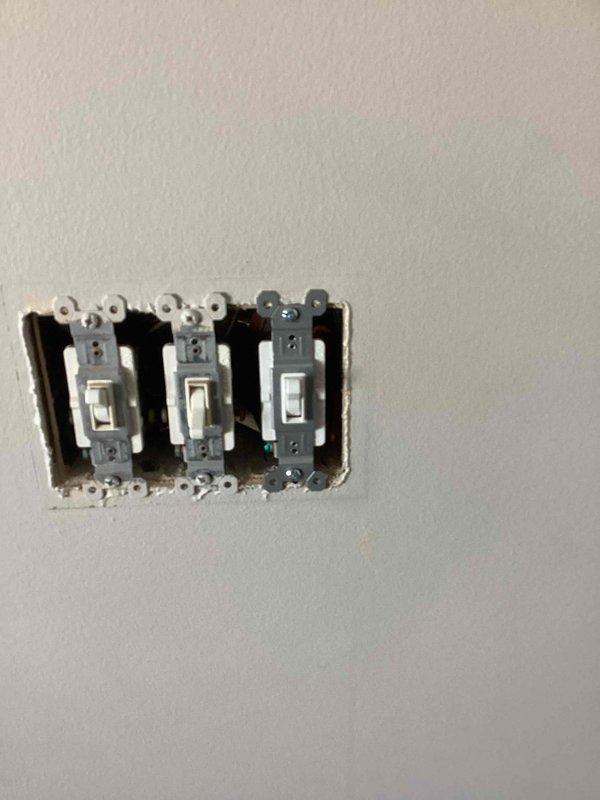 Diagnosed and repaired faulty electrical switches throughout the residence, including loose connections in three-way and four-way switches that were causing power interruption and noise in the stairway/landing lighting circuit. Replaced non-functioning bathroom fan timer switch with customer-provided replacement unit and verified proper operation of all repaired fixtures.