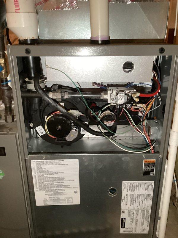 Performed scheduled preventative maintenance on residential HVAC system. Inspected furnace unit including blower motor, control board, wiring harnesses, and ventilation components. All systems appear to be in normal working condition with no visible issues detected.