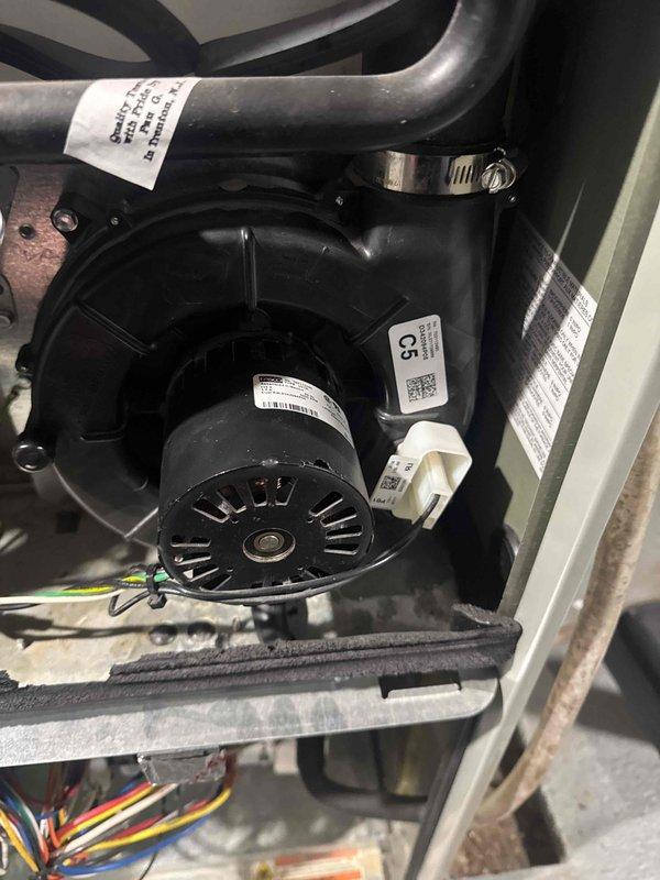 Responded to emergency no-heat call and diagnosed seized inducer motor as the cause of furnace failure. Successfully freed the inducer motor to restore temporary heat and ordered replacement parts for permanent repair. Recommended complete inducer assembly replacement due to age of system and component wear.