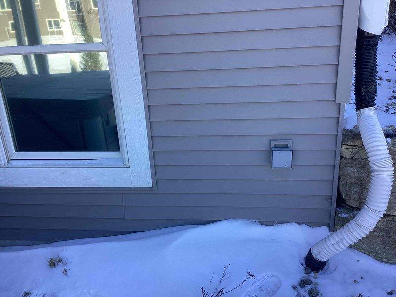 Arrived at customer's property to evaluate and connect hot tub to existing exterior 240V hookup. Inspected the outdoor electrical panel mounted on the vinyl siding and verified circuit was hot. Successfully completed connection for hot tub operation per customer request.