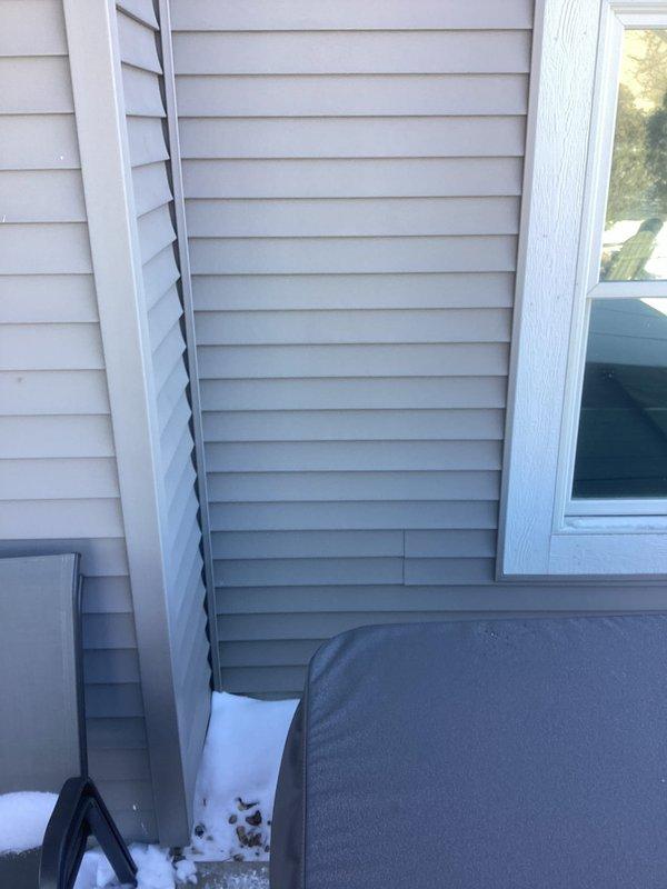 Arrived at customer's property to evaluate and connect hot tub to existing exterior 240V hookup. Inspected the outdoor electrical panel mounted on the vinyl siding and verified circuit was hot. Successfully completed connection for hot tub operation per customer request.