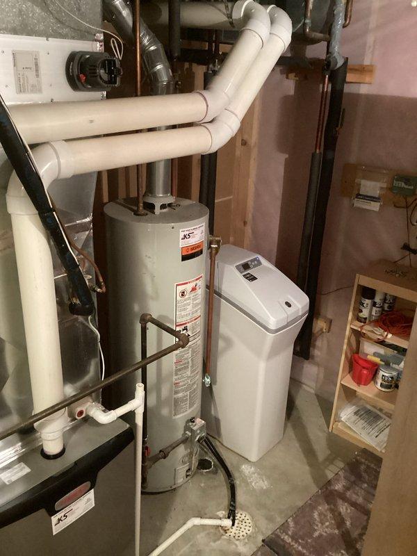 Responded to service call for furnace producing abnormal noise while still providing heat. Diagnosed excessive static pressure caused by customer's portable mist humidifier clogging the air filter. Replaced filter to resolve immediate issue and recommended installation of whole home humidifier and UV light system to prevent recurrence and improve indoor air quality.