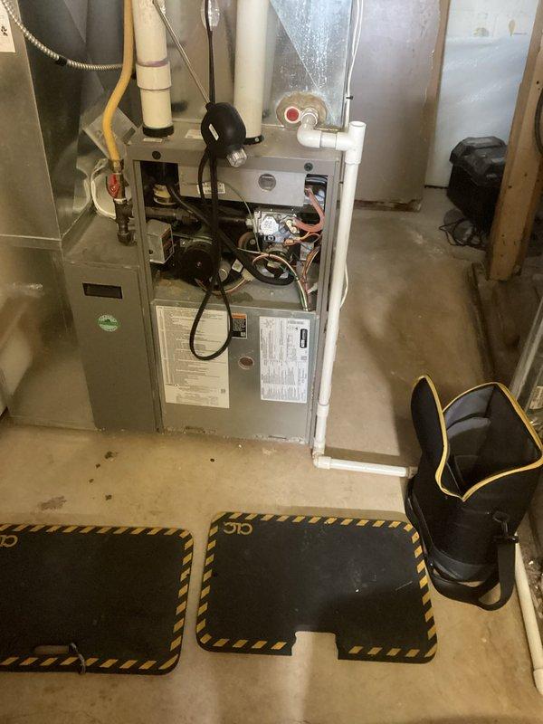 Completed annual preventive maintenance agreement service on residential gas furnace. Performed comprehensive inspection of unit with access panel open to examine internal components including control board, wiring, and motor. All ventilation piping, gas connections, and drainage system were visually inspected and verified to be in proper working condition.