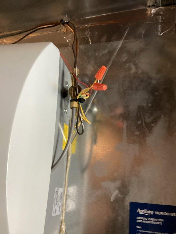 Responded to service call for non-functional Aprilaire humidifier that had been inoperative for approximately one year. Diagnostic inspection revealed incorrect wiring configuration and missing transformer. Installed new transformer and properly rewired the system, restoring full functionality to the humidifier control unit (Model 60).