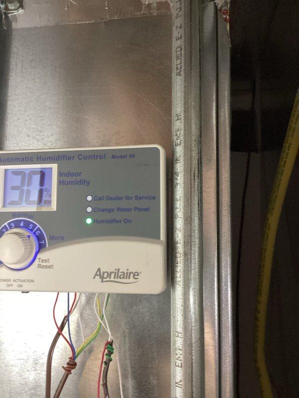 Responded to service call for non-functional Aprilaire humidifier that had been inoperative for approximately one year. Diagnostic inspection revealed incorrect wiring configuration and missing transformer. Installed new transformer and properly rewired the system, restoring full functionality to the humidifier control unit (Model 60).