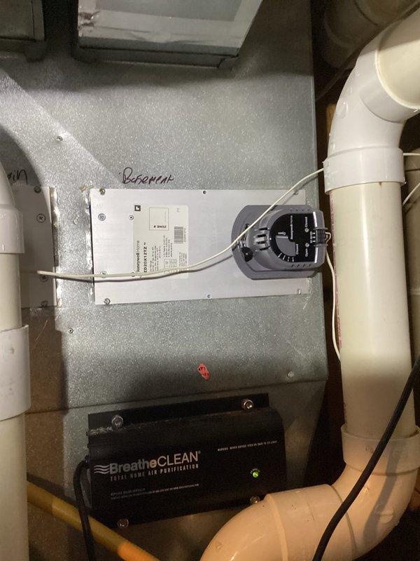 Responded to noise complaint where furnace was producing moaning/groaning sounds during shutdown. Diagnostic inspection revealed basement zone damper struggling to operate properly. Replaced defective damper to resolve noise issue and restore proper system function.