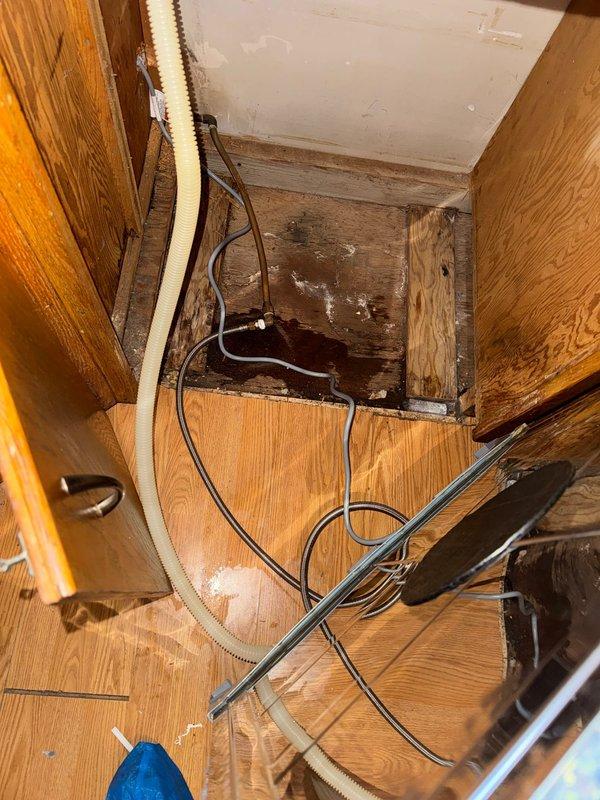 Responded to service call to install ball valve and hook up dishwasher. Upon arrival, installed dishwasher feed line and completed proper connection of dishwasher. Noted some water damage to subfloor in the installation area as documented in photos.