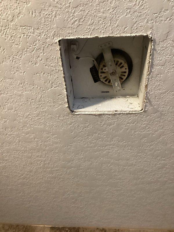 Responded to service call for non-functioning bathroom exhaust fan that was producing loud humming noise and failing to properly ventilate. Upon inspection, discovered bird nesting material obstructing the vent and damaged flapper. Cleaned ventilation pathway and fan assembly, removing accumulated debris that was causing operational issues and noise.