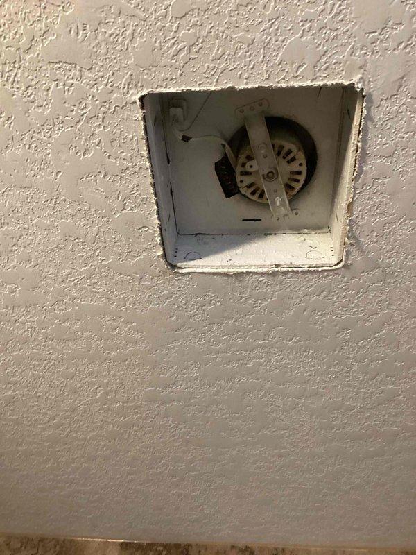 Responded to service call for non-functioning bathroom exhaust fan that was producing loud humming noise and failing to properly ventilate. Upon inspection, discovered bird nesting material obstructing the vent and damaged flapper. Cleaned ventilation pathway and fan assembly, removing accumulated debris that was causing operational issues and noise.