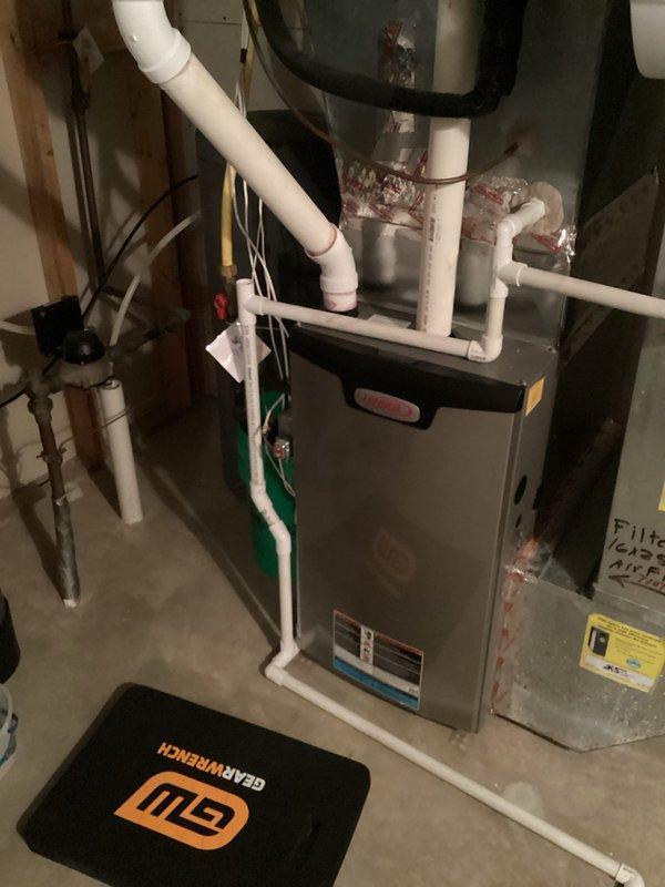 Performed scheduled preventive maintenance on residential HVAC system. Conducted comprehensive tune-up of furnace unit and connected PVC drainage/ventilation system. No issues identified; system functioning properly after service.