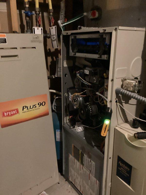 Performed scheduled maintenance on dual Bryant Plus 90 furnaces. Conducted combustion analysis with readings showing CO at 17P, CO2 at 6.1%, and air ratio at 93.6%. Inspected internal components including circuit board, wiring, and motor assembly. Completed system tune-up with no issues identified. Replaced filters on both units.