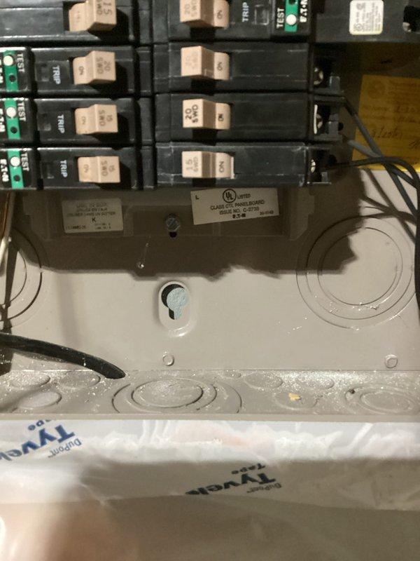 Installed a 15-amp circuit breaker in customer's panel to connect existing 12-gauge wiring for a dedicated sauna outlet in the utility room. Completed final connections and verified proper operation of the new circuit.