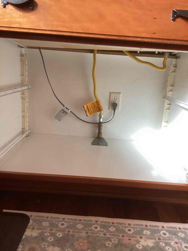 Completed conversion from gas stove to electric cooktop, which involved running a dedicated circuit from the basement, through the attic, and down to the kitchen. Inspected electrical panel to ensure proper capacity for the new circuit and verified the existing gas line would need to be capped by a plumber.