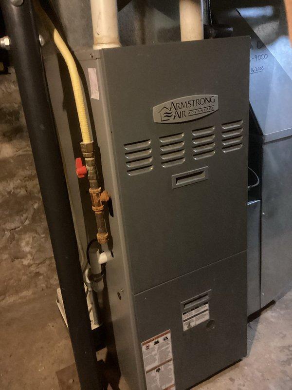 Responded to no heat call for Armstrong Air furnace. Diagnosed failed control board as root cause of heating failure. Replaced customer-supplied thermostat which was having operational issues. System tested and confirmed proper operation after component replacement.