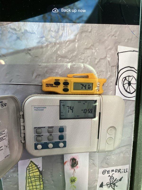 Responded to customer complaint regarding thermostat not maintaining temperature. Diagnostic inspection revealed restricted airflow due to customer blocking multiple supply and return vents. Verified thermostat functionality by confirming temperature reading matched independent measurement (both 74°F). Inspected control board and electrical components, finding all systems operational. Educated customer on proper airflow requirements and recommended removal of obstructions to ensure proper system performance.