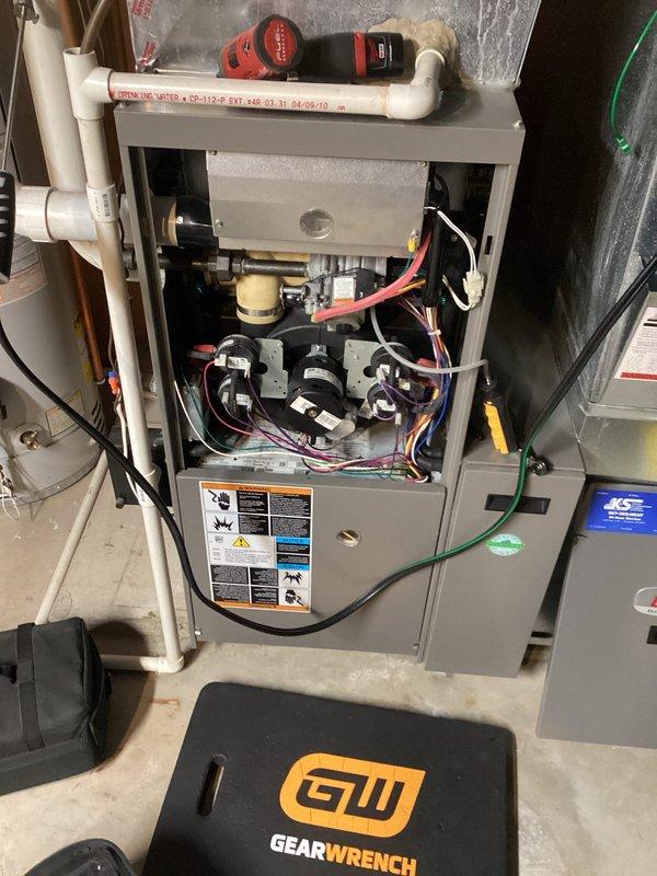 Performed scheduled preventive maintenance agreement service on residential heating system. Conducted comprehensive tune-up of furnace with inspection of adjacent water heater installation. All components functioning properly with no issues identified; system restored to optimal operating condition.