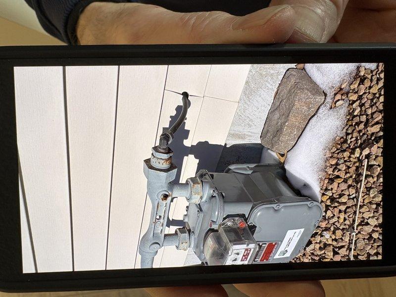 Performed comprehensive furnace tune-up on existing system showing signs of corrosion on internal components. Inspected gas meter connections and provided education to new homeowner regarding humidifier operation and maintenance. System operational despite age-related wear; no immediate repairs required.