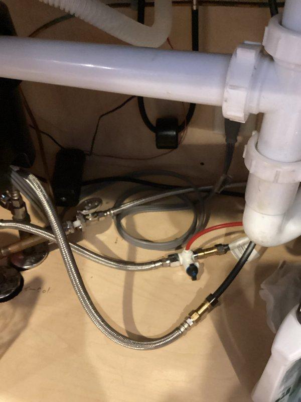Diagnosed non-functional kitchen motion sensor faucet and determined the issue was depleted batteries. Replaced batteries in the motion activation mechanism, restoring full functionality to the faucet. Verified proper operation of all components before completing service.