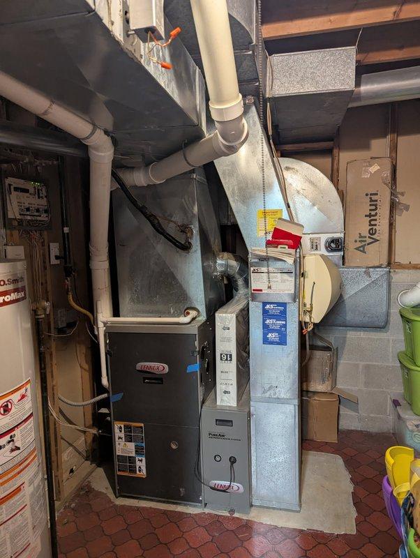 Responded to service call regarding zoning issues in 2-zone system where basement zone was not producing heat. Diagnosed non-functioning dampers in upstairs lower basement zones and identified significant airflow restrictions due to improper duct design. Inspected Lennox furnace unit and Honeywell zoning control system. Provided customer with recommendations for necessary damper repairs and scheduled follow-up estimate for potential furnace replacement or duct system redesign to resolve ongoing airflow issues.