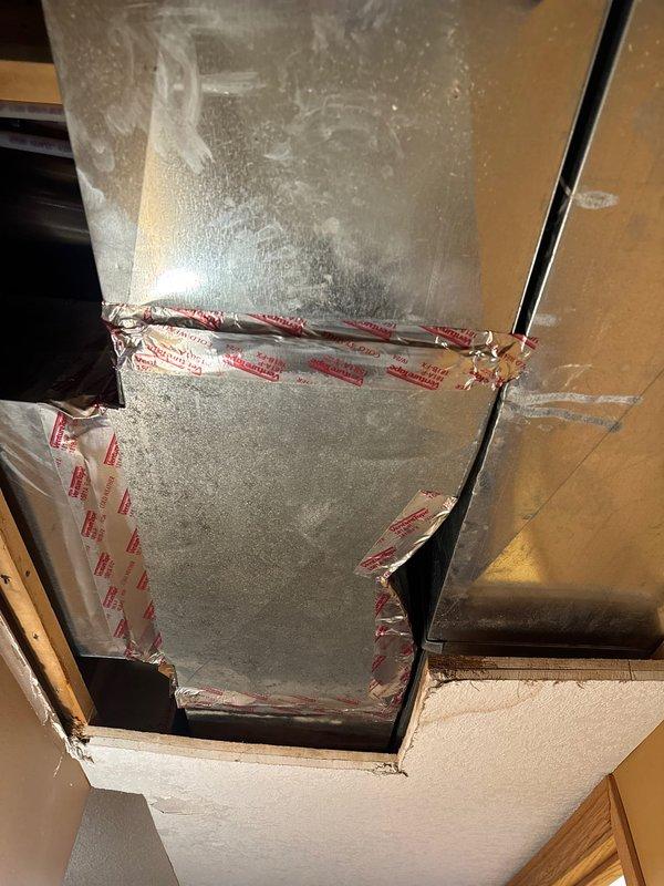 Repaired a pinhole leak in 1/2" PEX water line located above furnace trunk. Removed ductwork to access the leak, then replaced small section of PEX tubing. Completed service with proper sealing of access points.