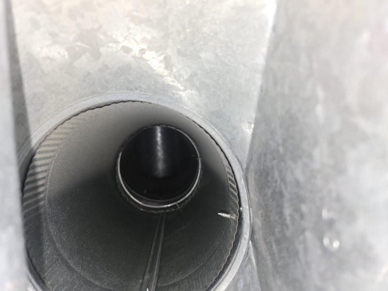 Performed comprehensive duct cleaning service on HVAC system, arriving within requested 12-1:30pm timeframe. Thoroughly cleaned main supply/return ducts and all accessible vents to remove accumulated dust and debris as evidenced by before/after inspection photos. Completed service after customer's departure, securing premises upon completion as requested.