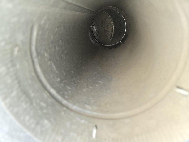 Performed comprehensive duct cleaning service on HVAC system, arriving within requested 12-1:30pm timeframe. Thoroughly cleaned main supply/return ducts and all accessible vents to remove accumulated dust and debris as evidenced by before/after inspection photos. Completed service after customer's departure, securing premises upon completion as requested.