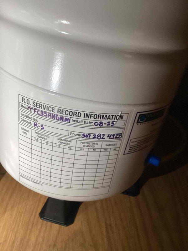 Performed scheduled maintenance service on customer's water treatment systems. Flushed water heater according to preventative maintenance agreement specifications and delivered replacement filters for the Flexcon FRO 122 reverse osmosis system. Documented model information (FCEDHNGM) and serial number for proper filter ordering and future service reference.