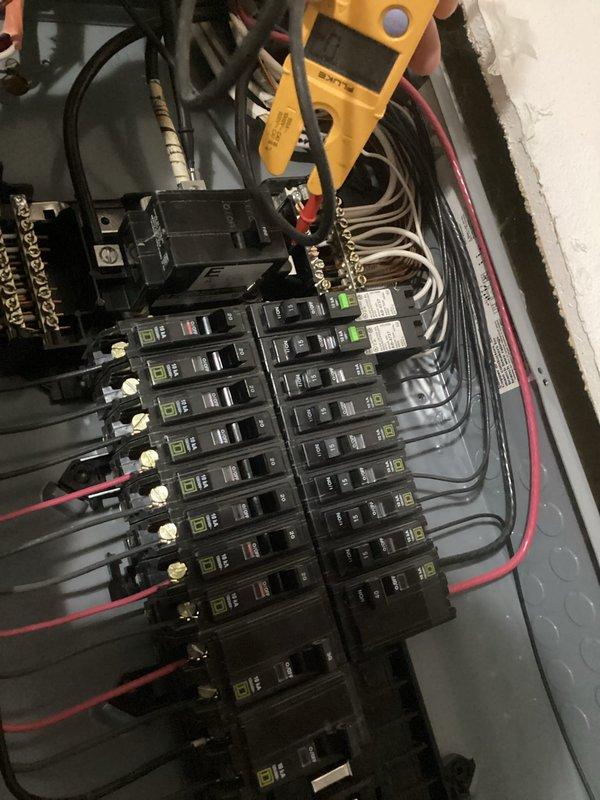 Responded to service call for power loss affecting multiple kitchen outlets, upstairs bathroom/office circuits, and furnace. Diagnostic testing with multimeter revealed complete loss of one electrical phase on utility side of connection. Contacted Rochester Public Utilities (RPU) to report outage and remained on site to verify restoration of service.