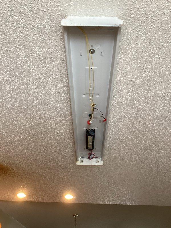 Diagnosed and replaced malfunctioning ballast in kitchen ceiling light fixture. Upon customer request, installed new complete light fixture instead of just replacing the component. Verified proper operation of new fixture before completing service.