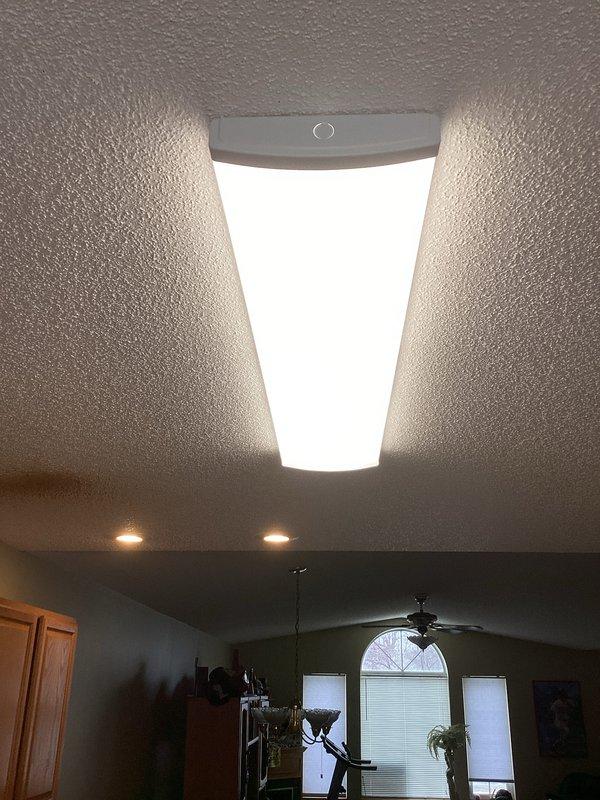 Diagnosed and replaced malfunctioning ballast in kitchen ceiling light fixture. Upon customer request, installed new complete light fixture instead of just replacing the component. Verified proper operation of new fixture before completing service.