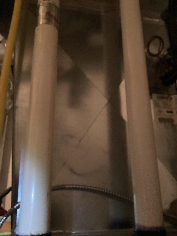 Performed preventative maintenance agreement service on air handler system. Conducted complete tune-up with combustion analysis showing CO readings of 23ppm, CO2 at 39ppm/7.0%, and excess air at 69.3%. Inspected water heater connections and verified proper operation of all system components. No issues identified; system operating within normal parameters.