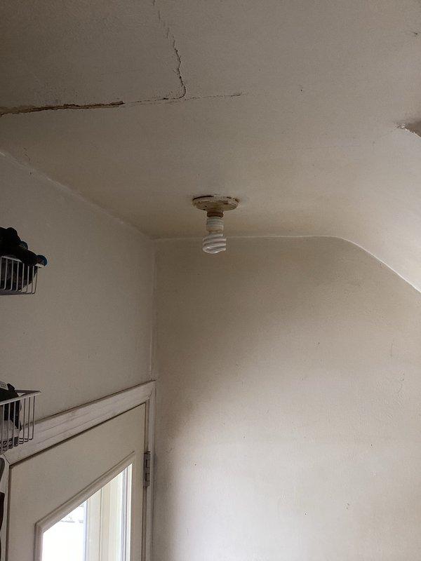 Installed three customer-provided overhead ceiling light fixtures. Completed testing and verified proper operation of all newly installed fixtures. Existing ceiling showed signs of cracking unrelated to electrical work.