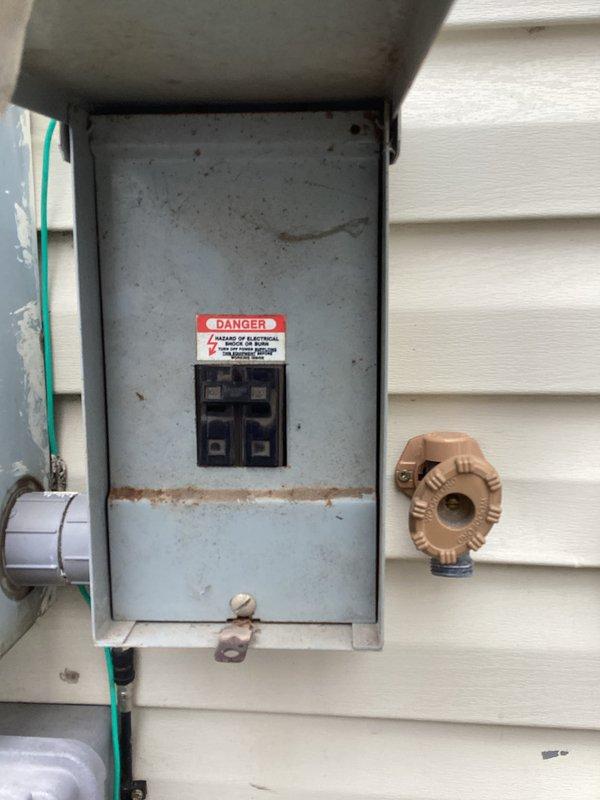 Responded to a no-power emergency affecting half of customer's home, including furnace (critical with small children present). Diagnostic testing revealed a faulty main breaker in the weathered exterior electrical service panel. Successfully replaced the defective main breaker, restoring full power to the residence.