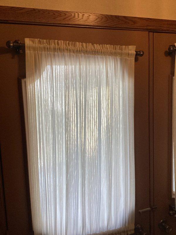 Responded to call for running toilet in Jack and Jill bathroom. Diagnosed faulty flapper valve preventing proper seal in 1976 Kohler full tank toilet. Removed old flapper and installed new replacement part, resolving the continuous running issue. Tested operation after repair with successful results.