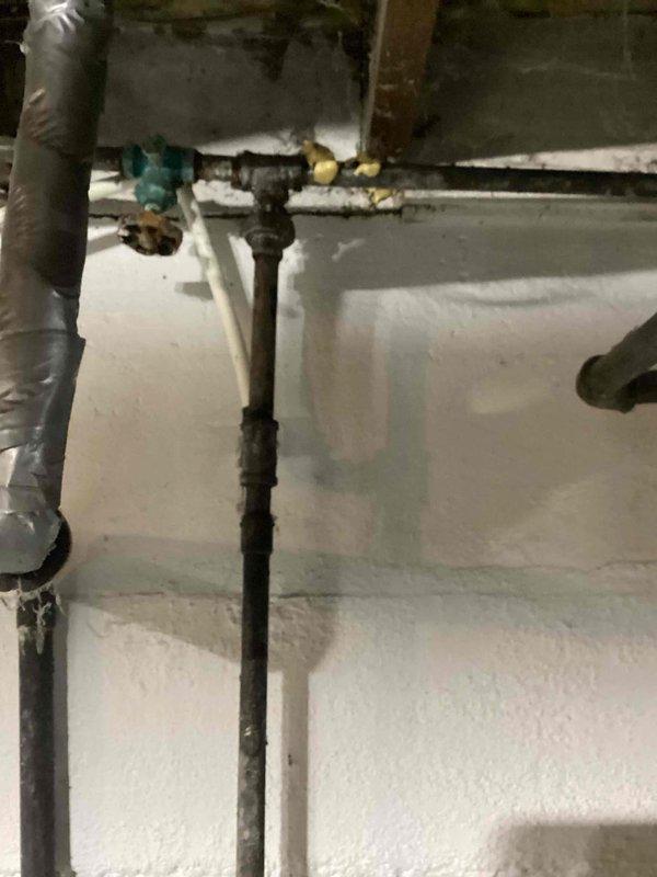 Fixed leaking galvanized water line above washing machine by removing damaged section and installing new line with male and female adapters using pro-press method. Restored water service to home with successful functionality test.