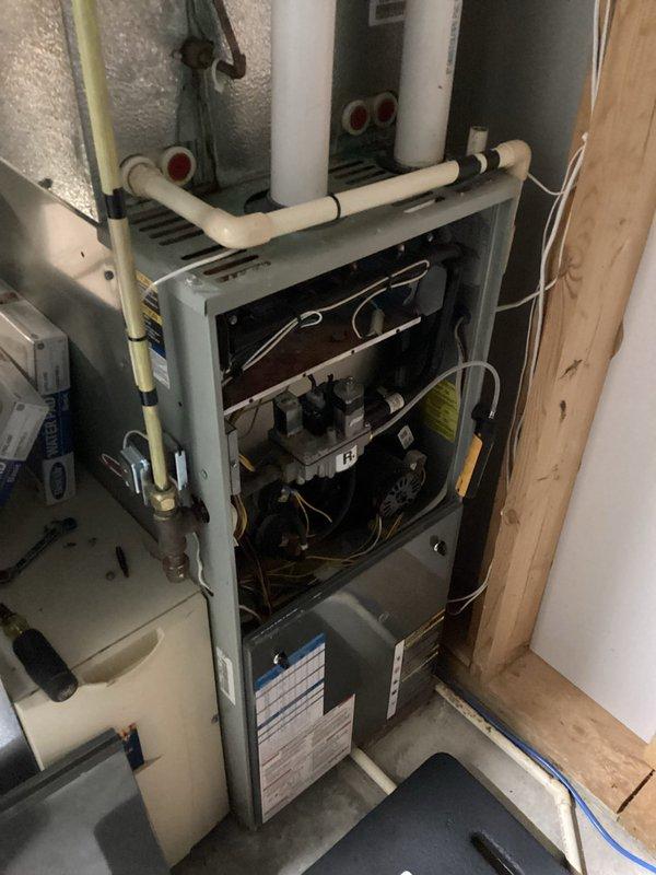 Performed scheduled preventative maintenance agreement service on residential HVAC system. Accessed and inspected furnace components, completed standard tune-up procedures including filter replacement. No issues identified during service; system operating normally upon completion.