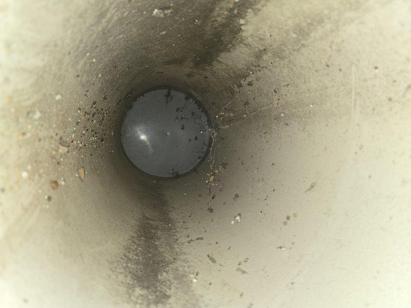 Performed comprehensive duct system cleaning, addressing significant dust and debris buildup as evidenced by interior duct inspection. Successfully cleared severely clogged dryer vent that contained hazardous lint accumulation, restoring proper airflow and reducing fire hazard risk.